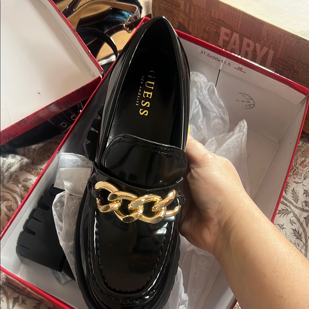 GUESS Shiny Black Loafers with Gold Accent